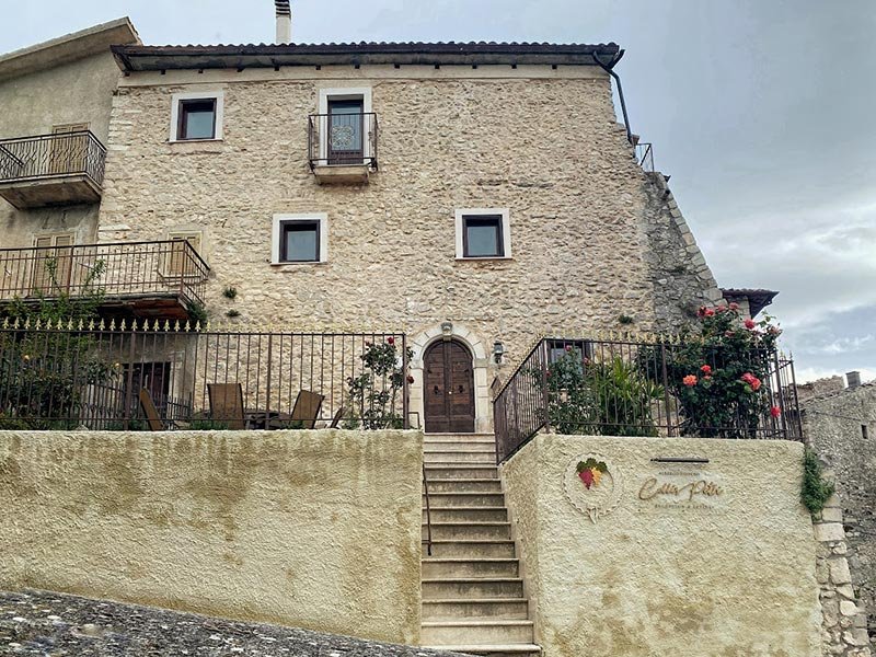 The stone house of the reception in Via Dietro le Mura